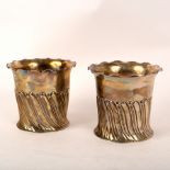 A pair of Victorian silver bottle coasters, HA, Sheffield 1892/1896, of half ribbed form, 11cm high,