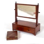 A 19th Century mahogany swing frame toilet mirror with box base and a small brass bound box