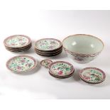 A Chinese punch bowl, Qianlong, decorated swags and floral sprays in puce,