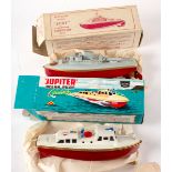 A Sutcliffe Jupiter ocean pilot clockwork cruiser and a Sutcliffe model Fury clockwork torpedo boat,