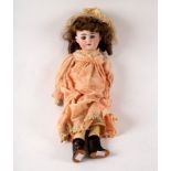 An Armand Marseille bisque head doll, marked AM Dep.