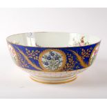 A Samson floral bowl with powder blue border, 29.