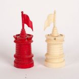 A set of Victorian natural and red stained bone chess men, kings 9cm high,