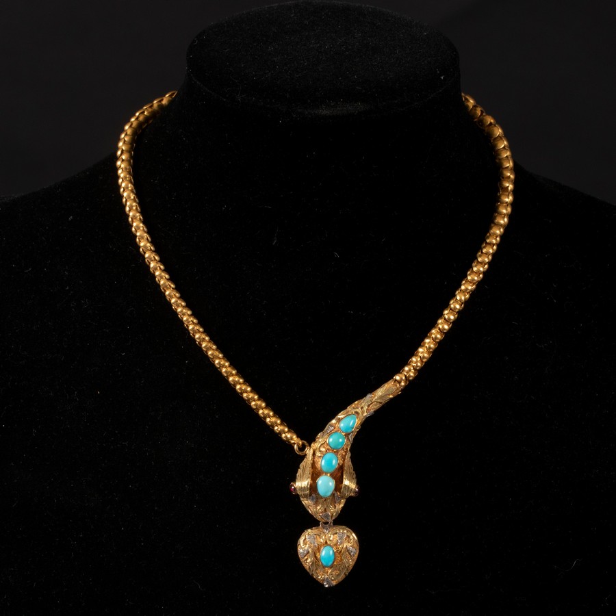 A Victorian snake necklace, the head with cabochon turquoise accents,