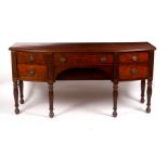 A 19th Century mahogany bowfront sideboard with ebony stringing,