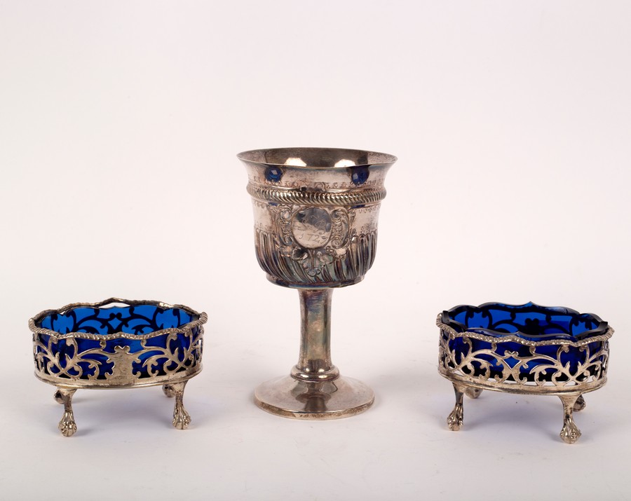 A pair of George III oval silver salts, London 1768, with blue glass liners, 8cm wide,