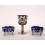 A pair of George III oval silver salts, London 1768, with blue glass liners, 8cm wide,