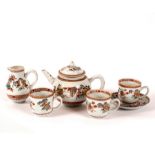 A mid 18th Century Chinese famille rose part tea set, comprising a bullet-shaped teapot and cover,