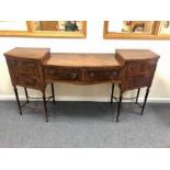 A George III mahogany bowfront sideboard,