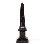 A decorative obelisk,