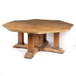 A large octagonal pine dining table,
