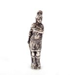 A Victorian figural white metal desk seal,