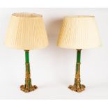 A pair of gilt metal mounted lamp bases,