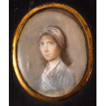 Early 19th Century English School/Portrait Miniature of a Young Girl/wearing a blue dress,