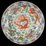 A Worcester saucer dish, circa 1775, after a Chinese famille verte original,
