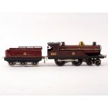 A Hornby clockwork 0-gauge 440 (MCL) locomotive and tender,