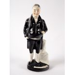 A pottery figure of Jemmy Wood, 30.