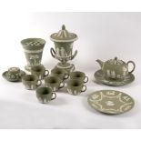 A group of Wedgwood green jasperware items to include two vases, and a part tea service,