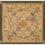 An Elizabethan chalice cover finely embroidered flowers and foliate decoration, with central cross,