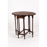 An oval two-flap gateleg table on slender bobbin-turned spider supports united by square stretchers,