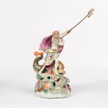 A Derby figure of Neptune, circa 1765-70, standing beside a dolphin,