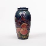 Moorcroft, a Finches pattern vase designed by Sally Tuffin, of slender ovoid form,