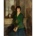 Walter Westley Russell RA (1867-1949)/Portrait of a Lady/wearing a green dress and standing beside