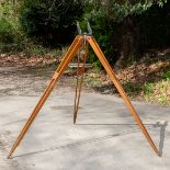 A large wooden tripod for a Broadhurst, Clarkson & Co.