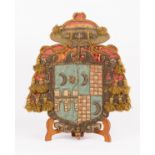 A late 16th Century Spanish applique and embroidered coat of arms denoting a prince-bishop (three
