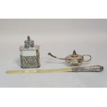 A silver embossed tea caddy and cover, London 1894,