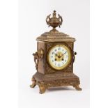 A French gilt metal mantel clock with eight-day movement, striking on a gong,