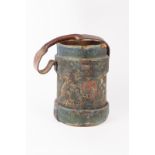 A military style drum-shaped wastepaper basket, originally a leather artillery shell case carrier,