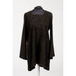 Jean Muir, London, a black suede tunic with long sleeves, punched detail to neck, hem and sleeves,