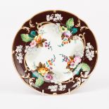 A Russian plate, circa 1860, Popov factory, painted flowers on a brown ground,