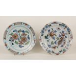 An 18th Century Bristol Delft dish painted flowers in underglaze green, red, blue and puce,
