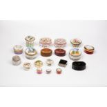 A quantity of trinket and pill boxes including pottery, enamel and porcelain examples,