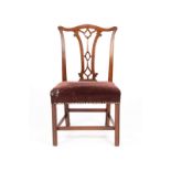 A late 18th Century Chippendale period single chair with pierced upright splat and upholstered seat,