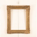 A picture frame with gesso moulded acanthus and c scrolls,