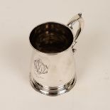 An early George II silver mug, maker indistinct, London 1734,