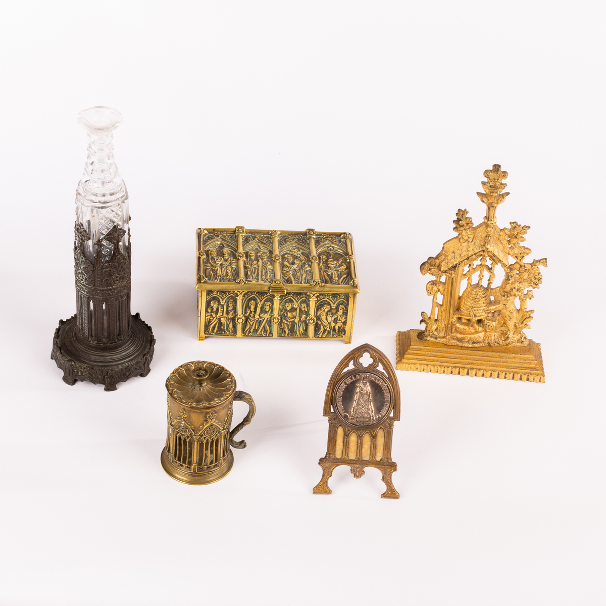 A group of chimney ornaments and brass ware,