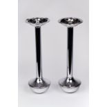 A pair of Art Deco style chrome smokers stands,