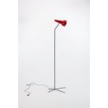 Manner of Bernard Schottlander/A 1950s floor lamp with adjustable red cone shaped shade, 158cm high,