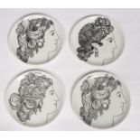 A set of four Fornasetti Milano Le Bellezze plates,