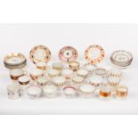 A collection of tea and coffee cups and saucers,