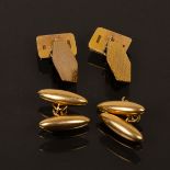 A pair of 9ct yellow gold cufflinks, the panels with engine turned decoration throughout,