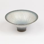 David White (1934-2011), a crackle glaze porcelain footed bowl, deep blue fading to white,