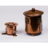 Arts & Crafts movement/A hammered copper inkwell, in the manner of F & J Pool of Hayle, Cornwall,