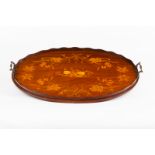 An Edwardian mahogany oval tray,