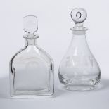 An Orrefors glass decanter with sloping shoulder engraved to one side with a double portrait