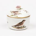 A Meissen circular sugar bowl and cover, circa 1750-60, with a flower finial,